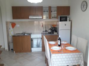 Kuchyň nebo kuchyňský kout v ubytování Apartmani Prpić