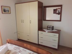 Postel nebo postele na pokoji v ubytování Apartmani Prpić