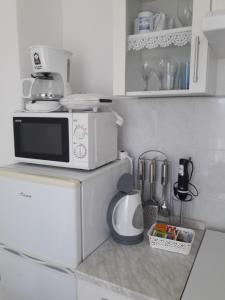 Kuchyň nebo kuchyňský kout v ubytování Apartmani Prpić
