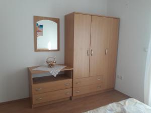 Postel nebo postele na pokoji v ubytování Apartmani Prpić