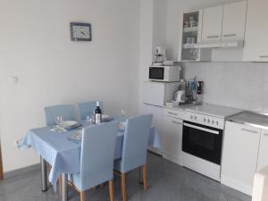 Kuchyň nebo kuchyňský kout v ubytování Apartmani Prpić