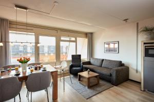 Posezení v ubytování Appartement Amelanderoase 83 im Amelander Paradijs