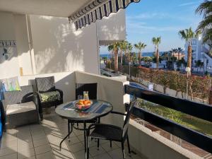 A seating area at Otylia La Calma Sun Apartment With Sea View
