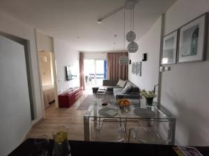 A seating area at Otylia La Calma Sun Apartment With Sea View