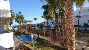 The swimming pool at or close to Otylia La Calma Sun Apartment With Sea View