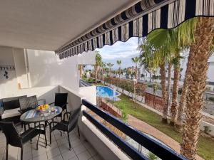 The swimming pool at or close to Otylia La Calma Sun Apartment With Sea View