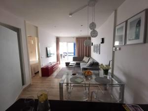 A seating area at Otylia La Calma Sun Apartment With Sea View