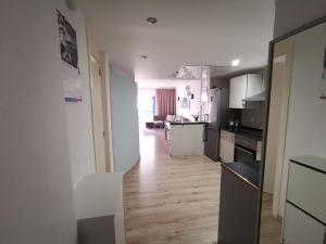A kitchen or kitchenette at Otylia La Calma Sun Apartment With Sea View