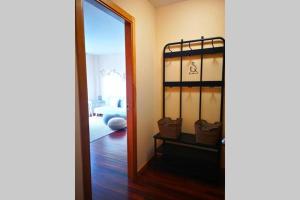 Łóżko lub łóżka w pokoju w obiekcie Apartamento con vistas al mar, playa de Carnota!