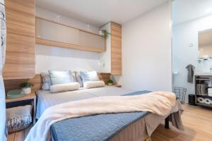 Кровать или кровати в номере Mobile Homes AZZURRO