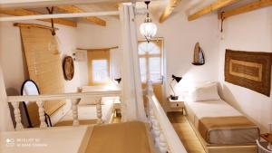 Posteľ alebo postele v izbe v ubytovaní Afrodite Luxury Rooms