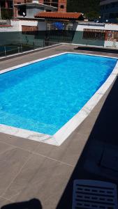 Piscine de l'établissement Casa de praia maranduba ou située à proximité