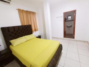 Postel nebo postele na pokoji v ubytování Hostal El Naufrago 1