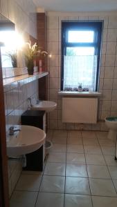Kúpeľňa v ubytovaní Pensjonacik Zacisze