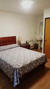 Postel nebo postele na pokoji v ubytování Hotel Centric Chihuahua