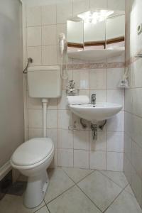 Imagem da galeria de La Familia Apartments em Makarska