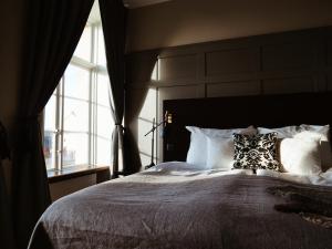 Postel nebo postele na pokoji v ubytování Clarion Hotel Wisby