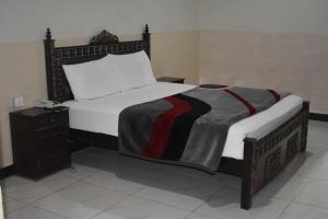 Cama ou camas em um quarto em Hotel Khursheed Palace