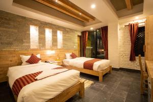 Uma cama ou camas num quarto em Hotel Mera Peak Private Limited