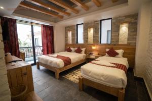 Uma cama ou camas num quarto em Hotel Mera Peak Private Limited