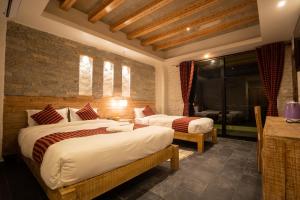 Uma cama ou camas num quarto em Hotel Mera Peak Private Limited