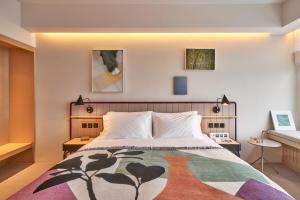 A bed or beds in a room at the Arca