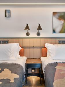 A bed or beds in a room at the Arca
