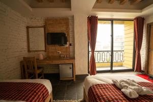 Uma cama ou camas num quarto em Hotel Mera Peak Private Limited
