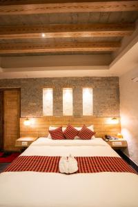 Uma cama ou camas num quarto em Hotel Mera Peak Private Limited