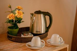 Příslušenství pro přípravu čaje a kávy v ubytování kaje cottage & restaurant