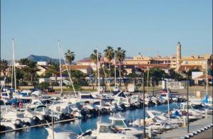 a bunch of boats docked in a harbor at Hotel Playa Canet in Canet de Berenguer