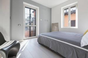 Posteľ alebo postele v izbe v ubytovaní Unique 4 Storey House on Naviglio 4Bd, 4Bt