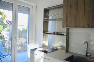 Kuchyň nebo kuchyňský kout v ubytování Casa Lighea Mondello - 200 mt dalla spiaggia