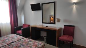 Postel nebo postele na pokoji v ubytování Hotel Bagoeira