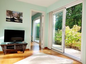 TV a/nebo společenská místnost v ubytování B&B prince d’Orange Waterloo