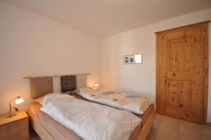 En eller flere senger på et rom på Costa dad Archas A4