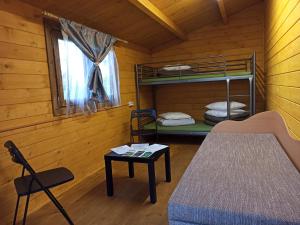 Postel nebo postele na pokoji v ubytování Biržai camping