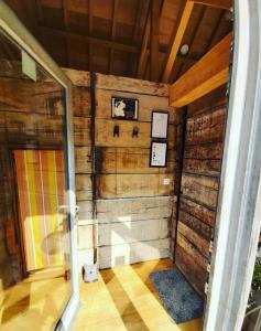 an inside view of a room with wooden walls at De linderd in Aalst