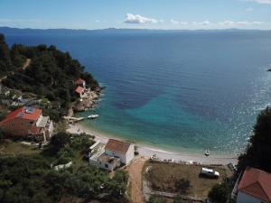 an aerial view of a beach next to the water at Holiday house Stela in Gdinj