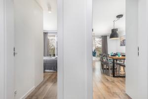 Posteľ alebo postele v izbe v ubytovaní Apartamenty Wyspa Solna by Noclegi Renters