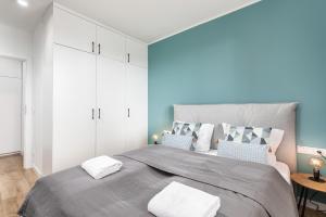 Posteľ alebo postele v izbe v ubytovaní Apartamenty Wyspa Solna by Noclegi Renters