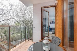 Balkón alebo terasa v ubytovaní Apartamenty Wyspa Solna by Noclegi Renters