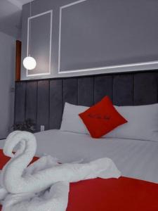 Postel nebo postele na pokoji v ubytování Tan Binh Hotel