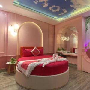 Postel nebo postele na pokoji v ubytování Tan Binh Hotel