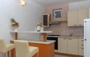 Kuchnia lub aneks kuchenny w obiekcie House Green Side Sunset