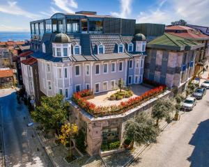 an overhead view of a large building with flowers at Amiral Palace Hotel Boutique Class in Istanbul