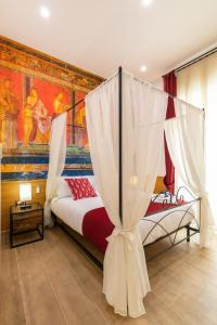 Postel nebo postele na pokoji v ubytování Le Meraviglie Di Napoli