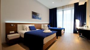 Katil atau katil-katil dalam bilik di Condo Studio Plaza