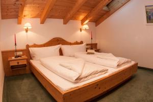 Postel nebo postele na pokoji v ubytování Haus Lenz