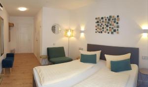 Postel nebo postele na pokoji v ubytování Füssen Apartments - Center Apartments